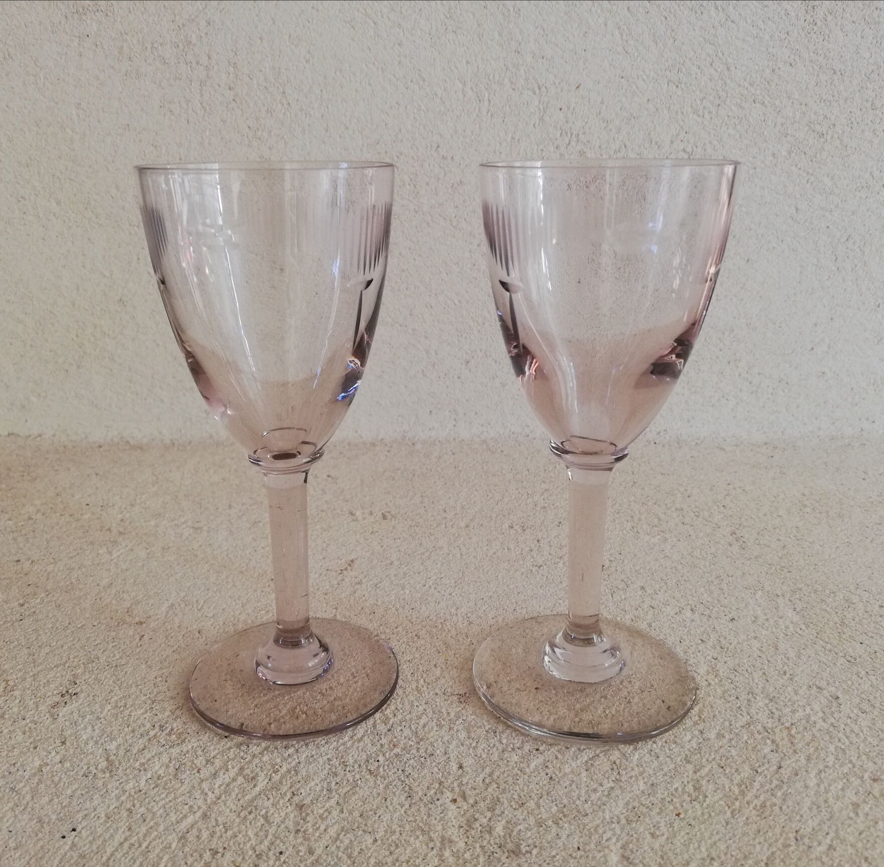 2 stemmed glasses early 20th