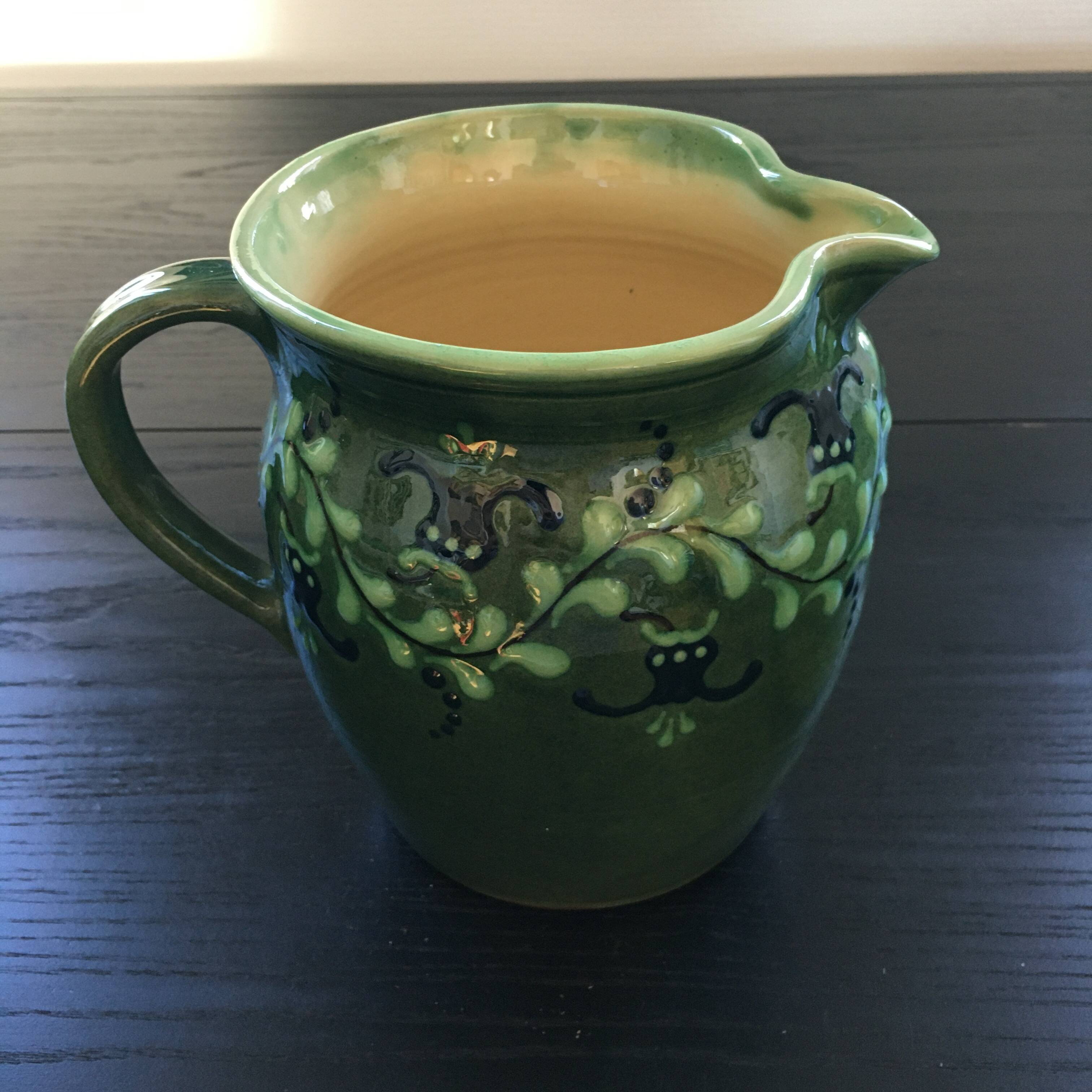 Large pitcher with floral decoration