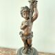 Candelabra with cherub in patinated bronze