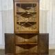 19th-century English corner cabinet in oak, mahogany, and fir.
