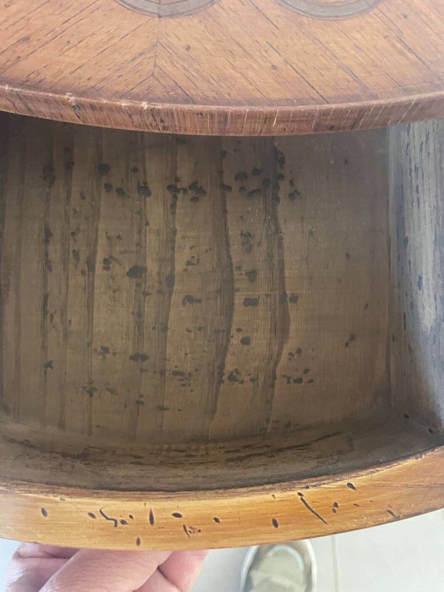 Oval bedside table from the Transition period in marquetry and bronze.