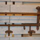 Coats in wrought iron door