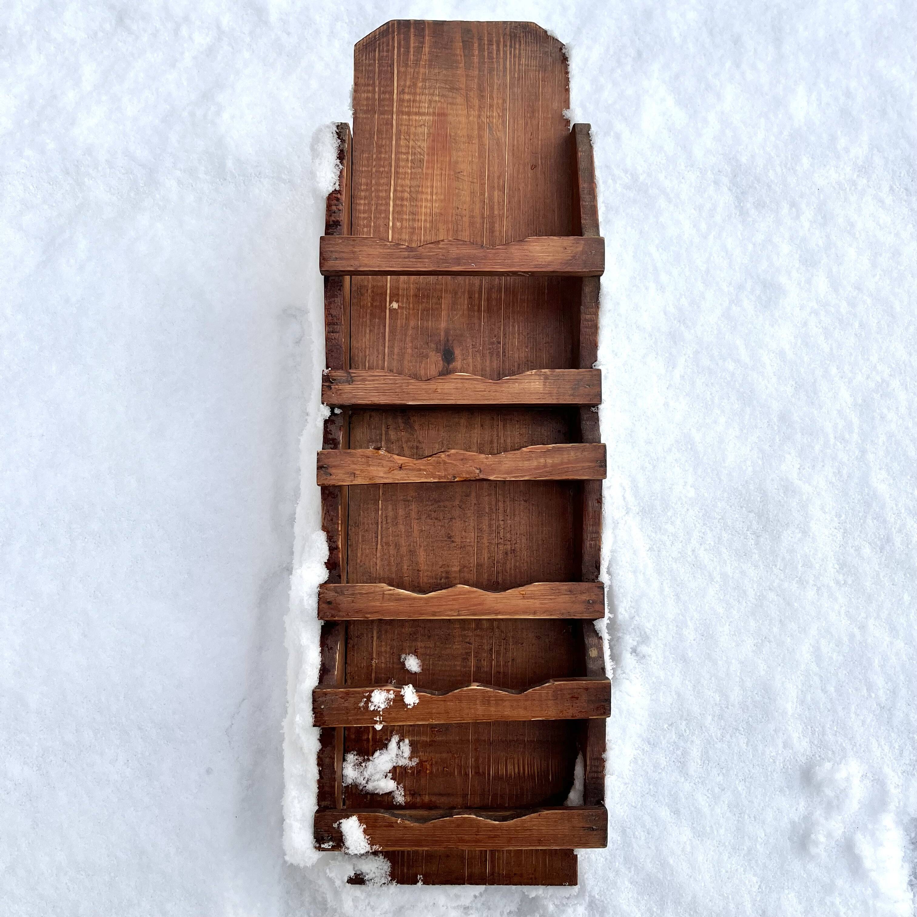 Old wall shelf for postcards or mail