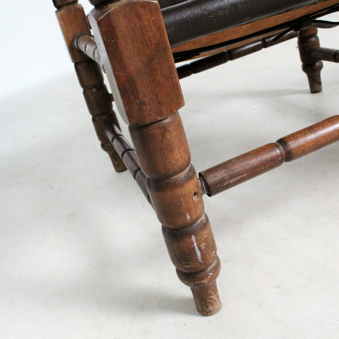 Pairs of vintage Safari style armchairs in wood and leather