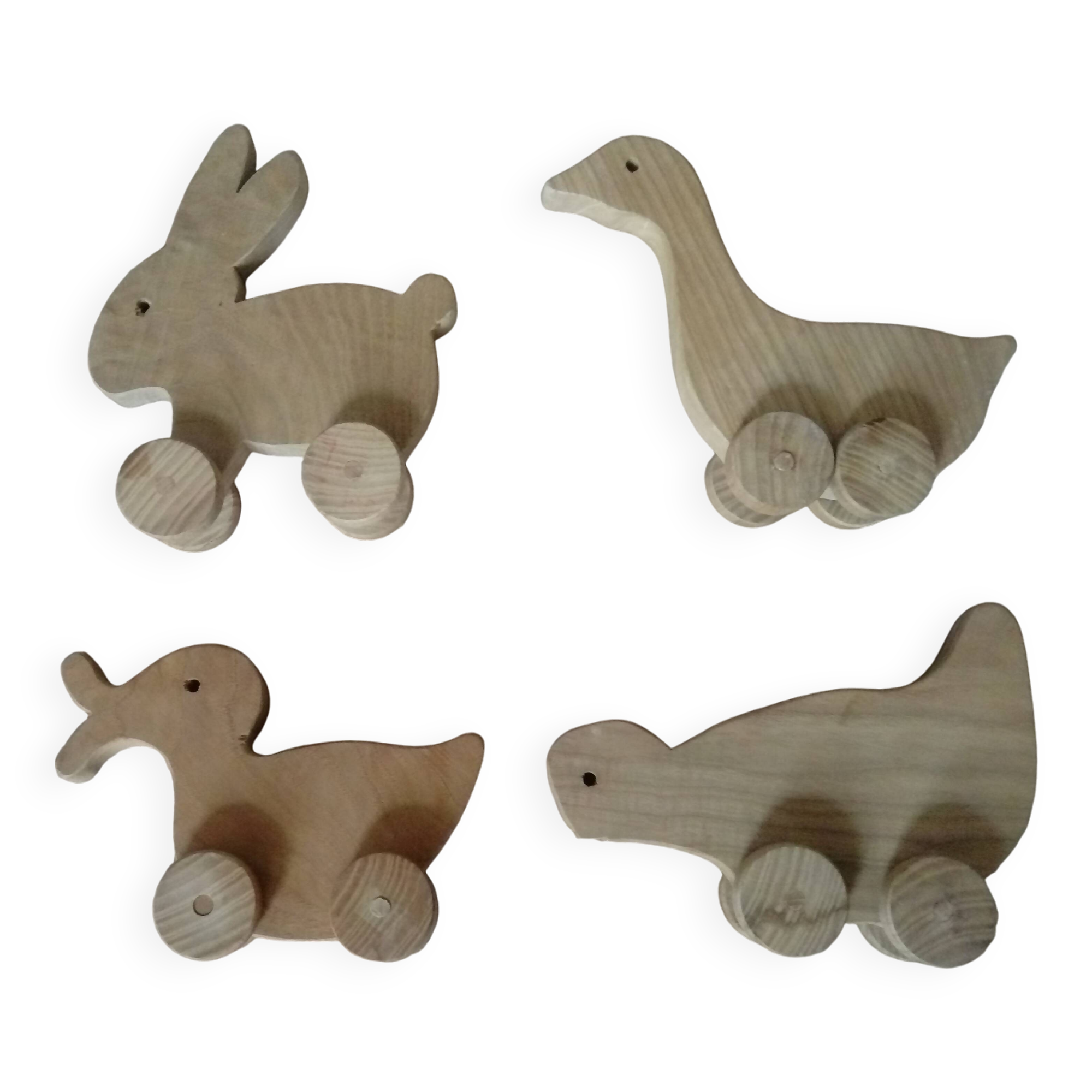 set of 4 wooden toys on wheels