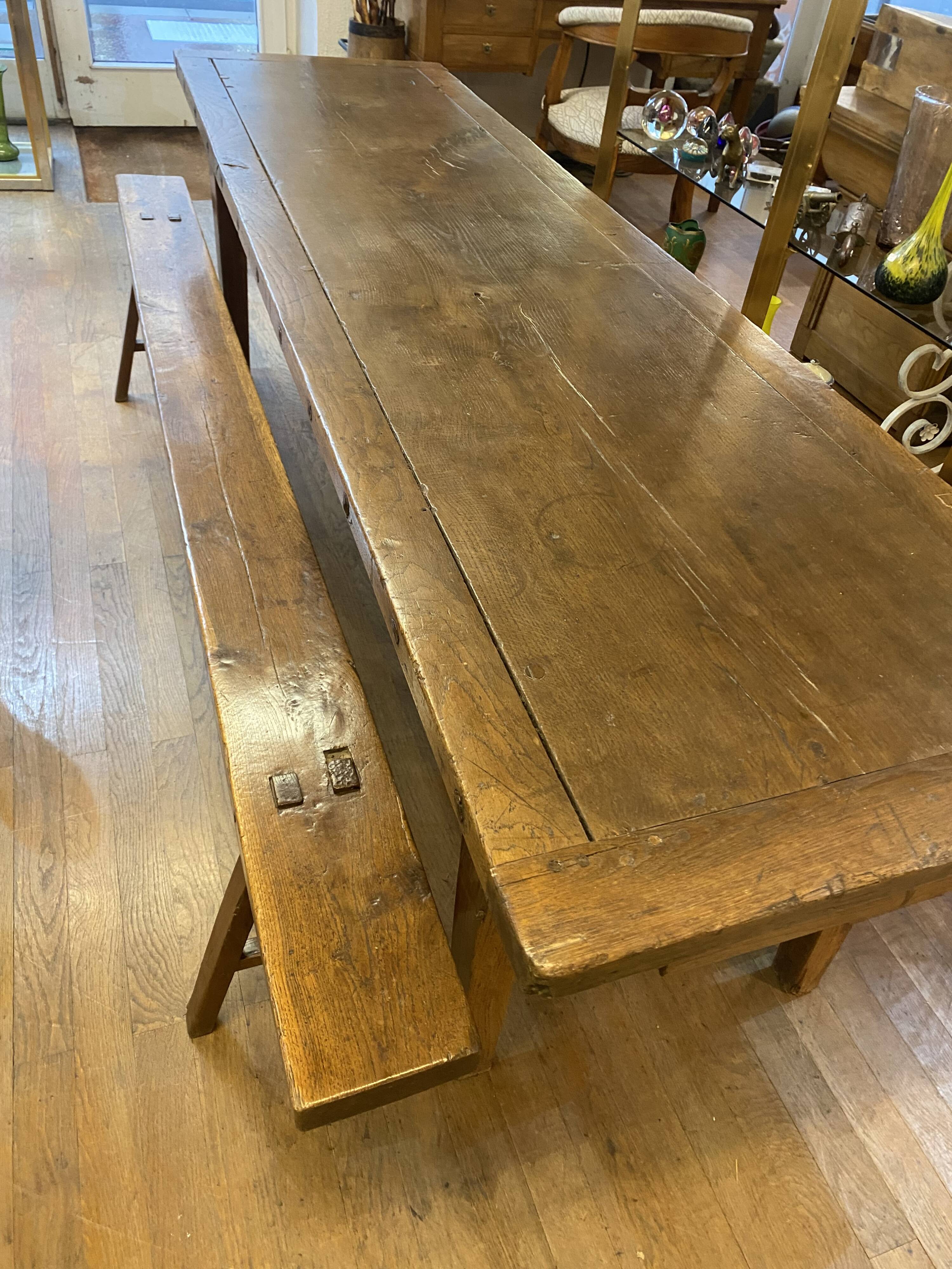 Farm table with its 2 benches.