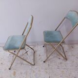 Two folding opera chairs in velvet