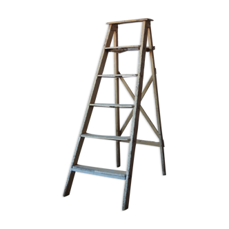 Stepladder of old painter patinated yellow