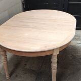 Round table with two raw cherry wood extensions