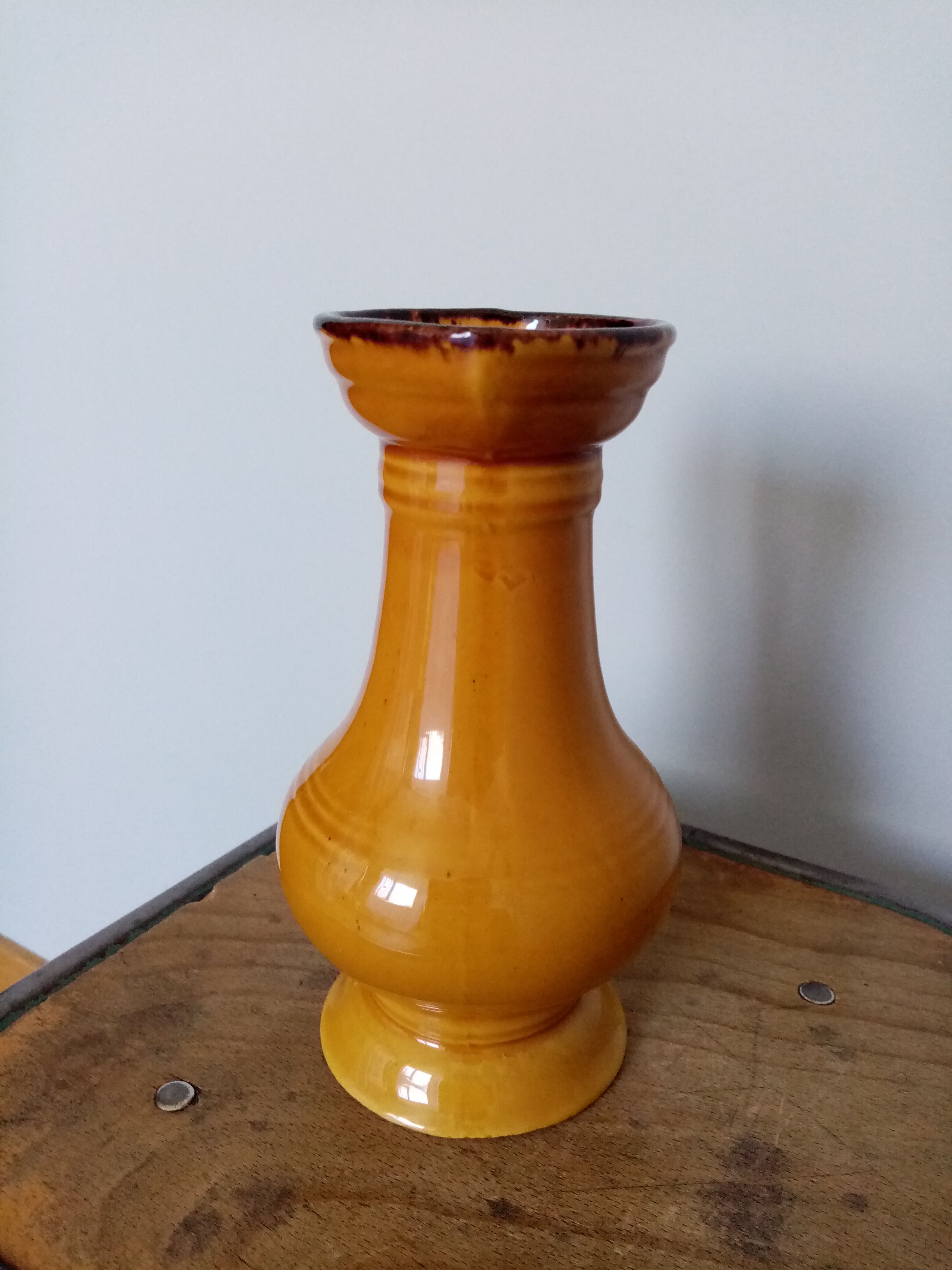 Mustard yellow enamelled ceramic pitcher