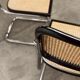 Pair of black Breuer b32 chairs and cannage