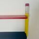 Wall shelf by Pierre Sala giant crayons from the 80s.