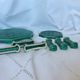 Set of 6 knife holders, a trivet, a 1960s bottle coaster