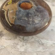 Flattened spherical vase made of glass paste