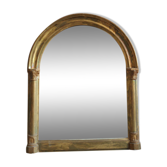 Mirror in gilded wood in the shape of an arche XVlllth