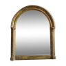 Mirror in gilded wood in the shape of an arche XVlllth