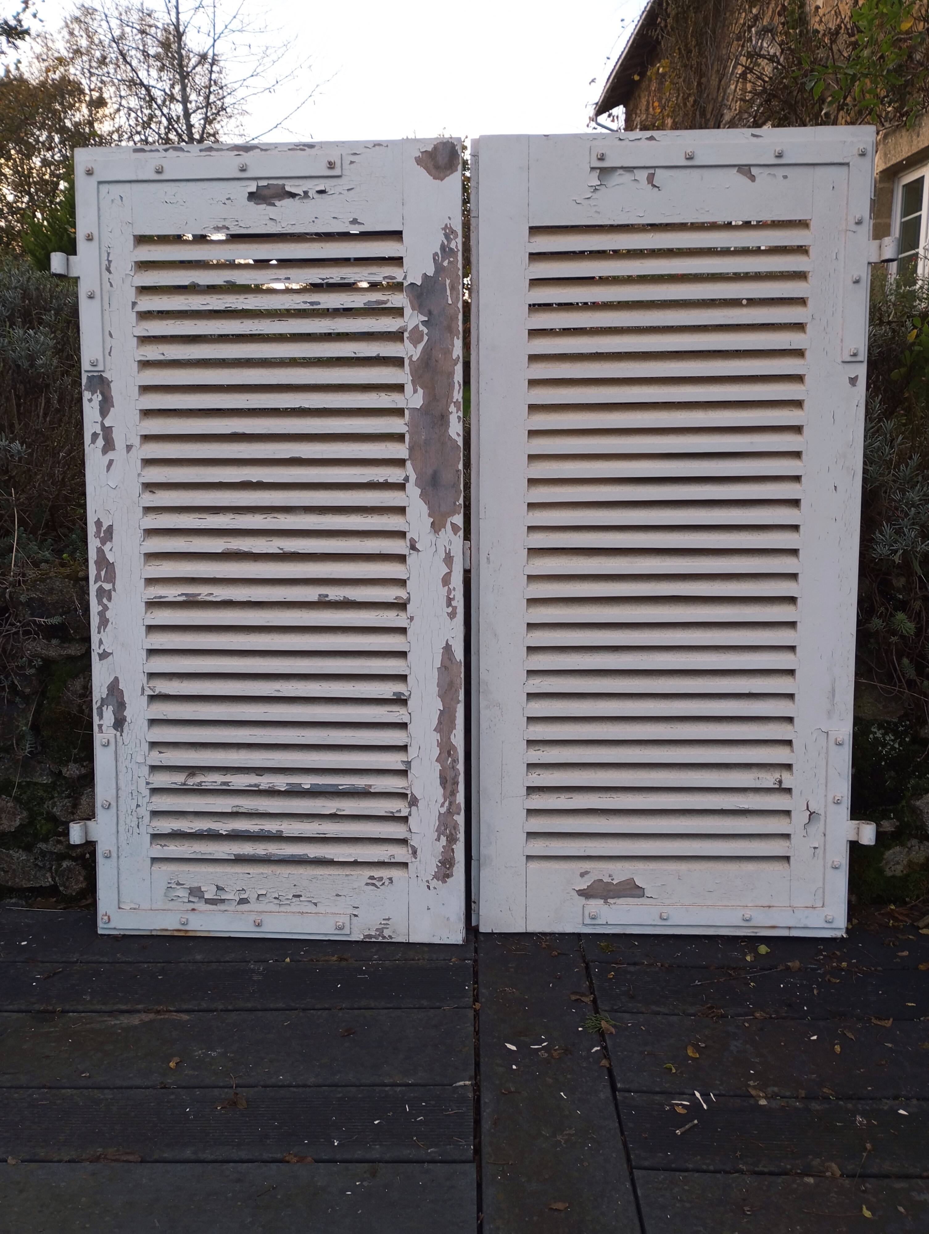 Pair of tropical wood shutters