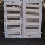 Pair of tropical wood shutters