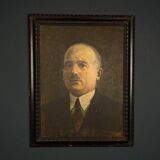Portrait of a man in a suit, late 19th century, oil on plywood.