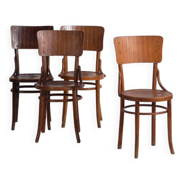 Vintage Thonet bentwood chairs (c.1940). Set of 4 pieces.