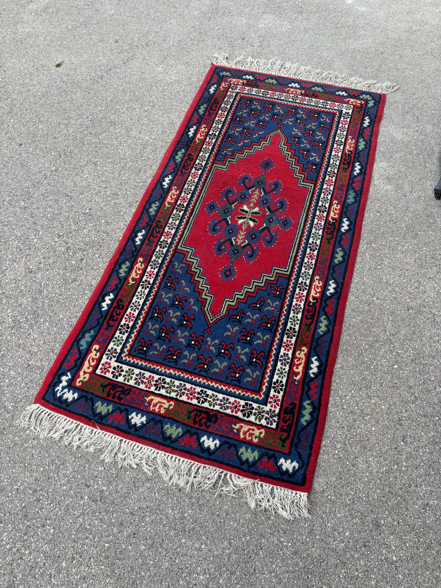 Handwoven wool oriental rug – 220 × 100 cm