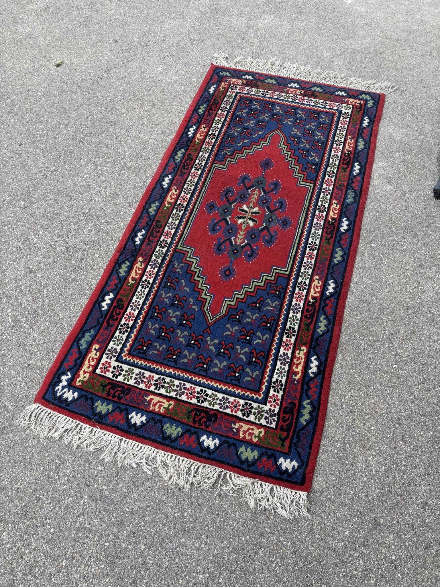 Handwoven wool oriental rug – 220 × 100 cm