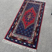 Handwoven wool oriental rug – 220 × 100 cm