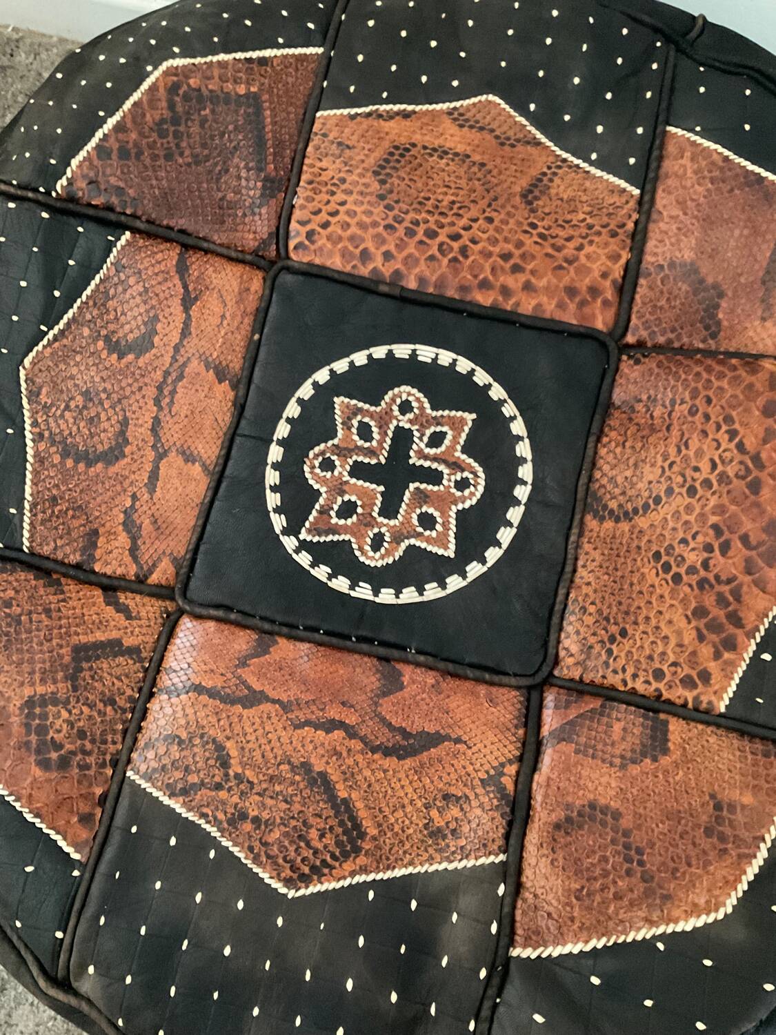 Vintage leather and snakeskin pouf