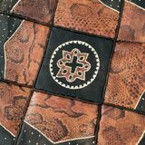 Vintage leather and snakeskin pouf