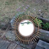 Vintage rattan sun mirror