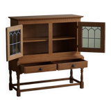 20th-century solid oak display cabinet with a glass front, by a Danish cabinetmaker.