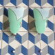 Pair of modernist sconces in screen-printed glass