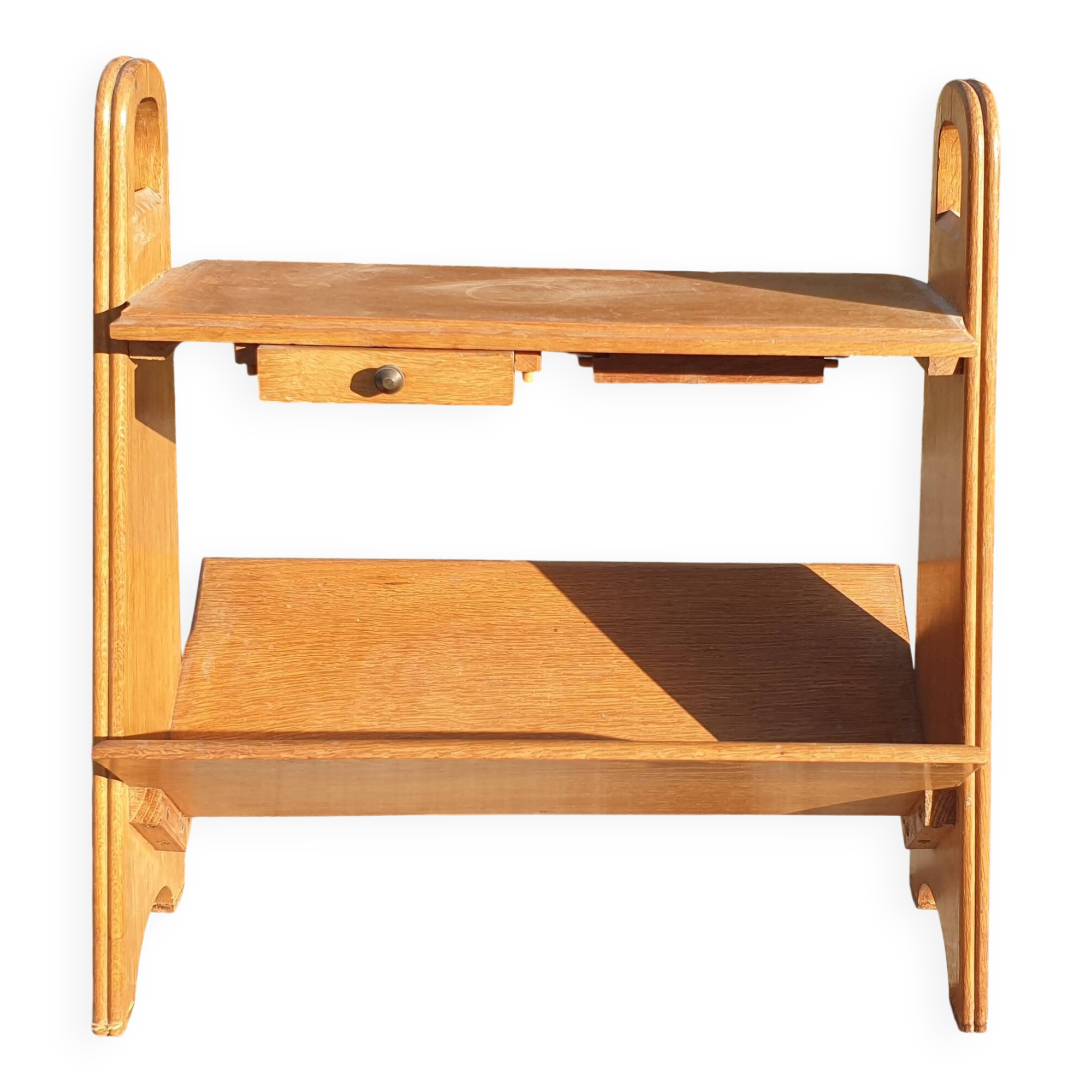 Magazine rack with sliding drawers in light wood, Scandinavian style.