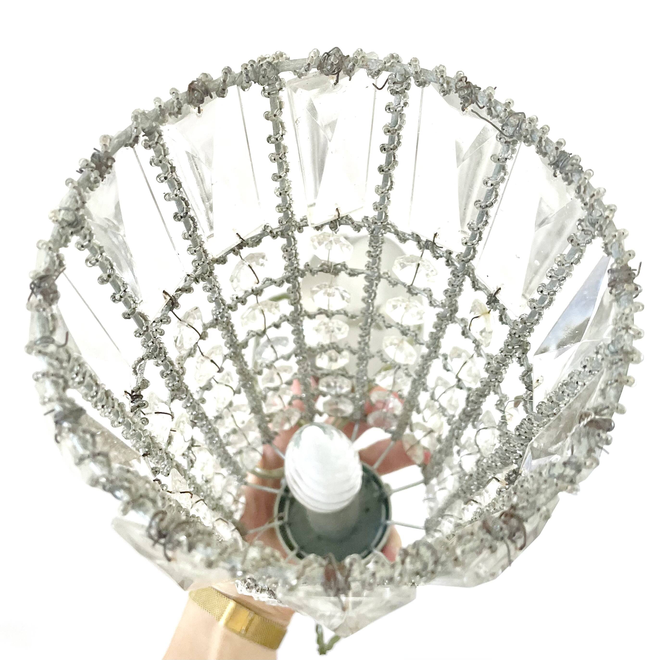 Suspension in old glass beads