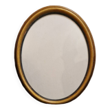 Golden oval frame