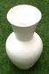 White baluster-shaped vase made of terracotta / ceramic