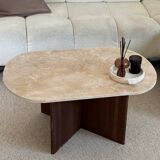 Oval coffee table in travertine and dark oak.
