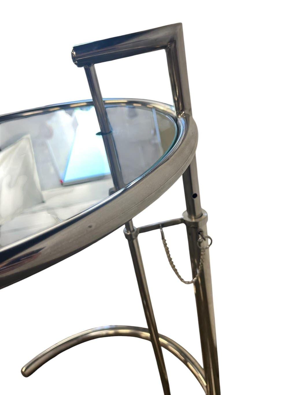 Vintage adjustable chrome side table with smoked glass.