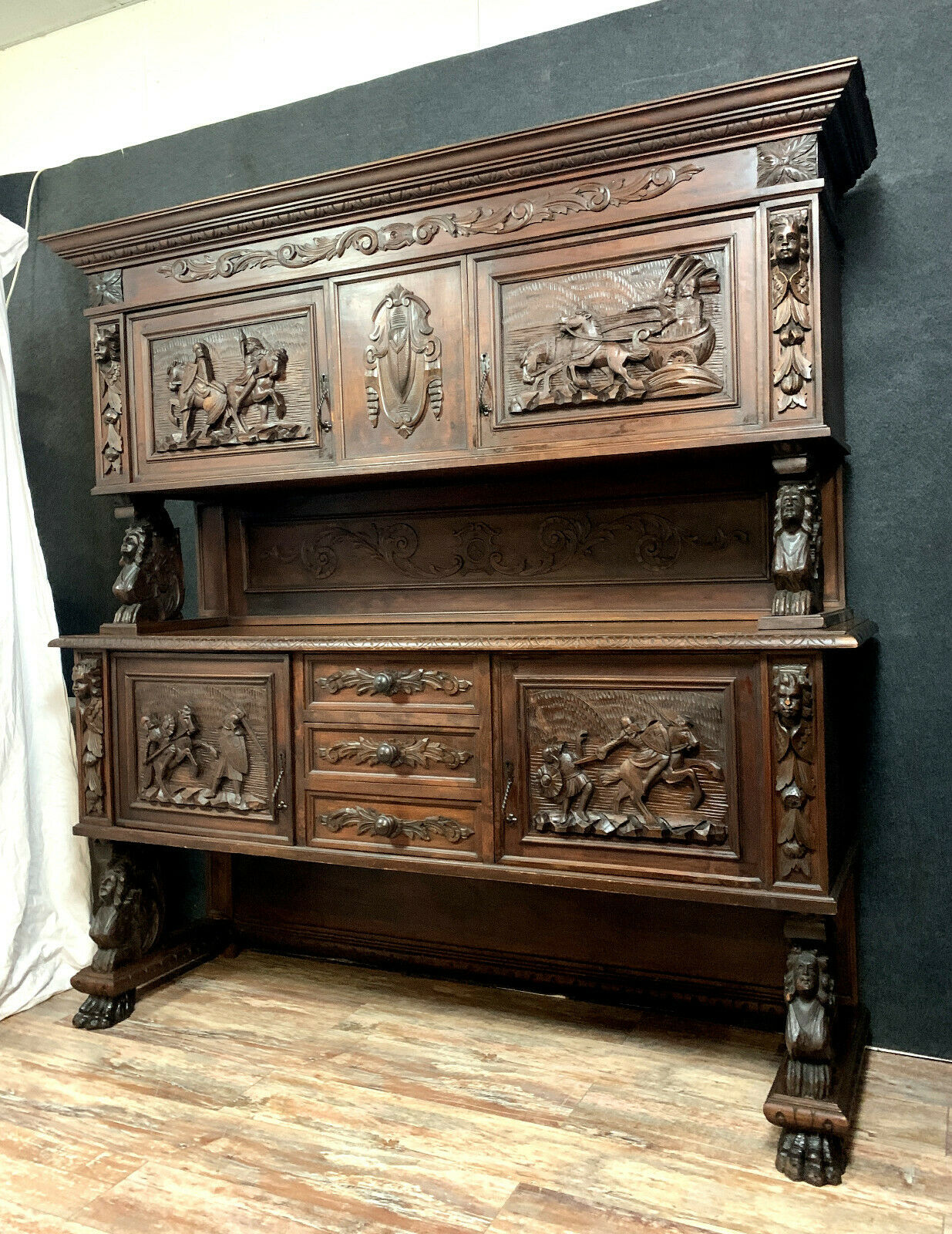 Wooden Renaissance hunting pavilion buffet made entirely carved with war attributes