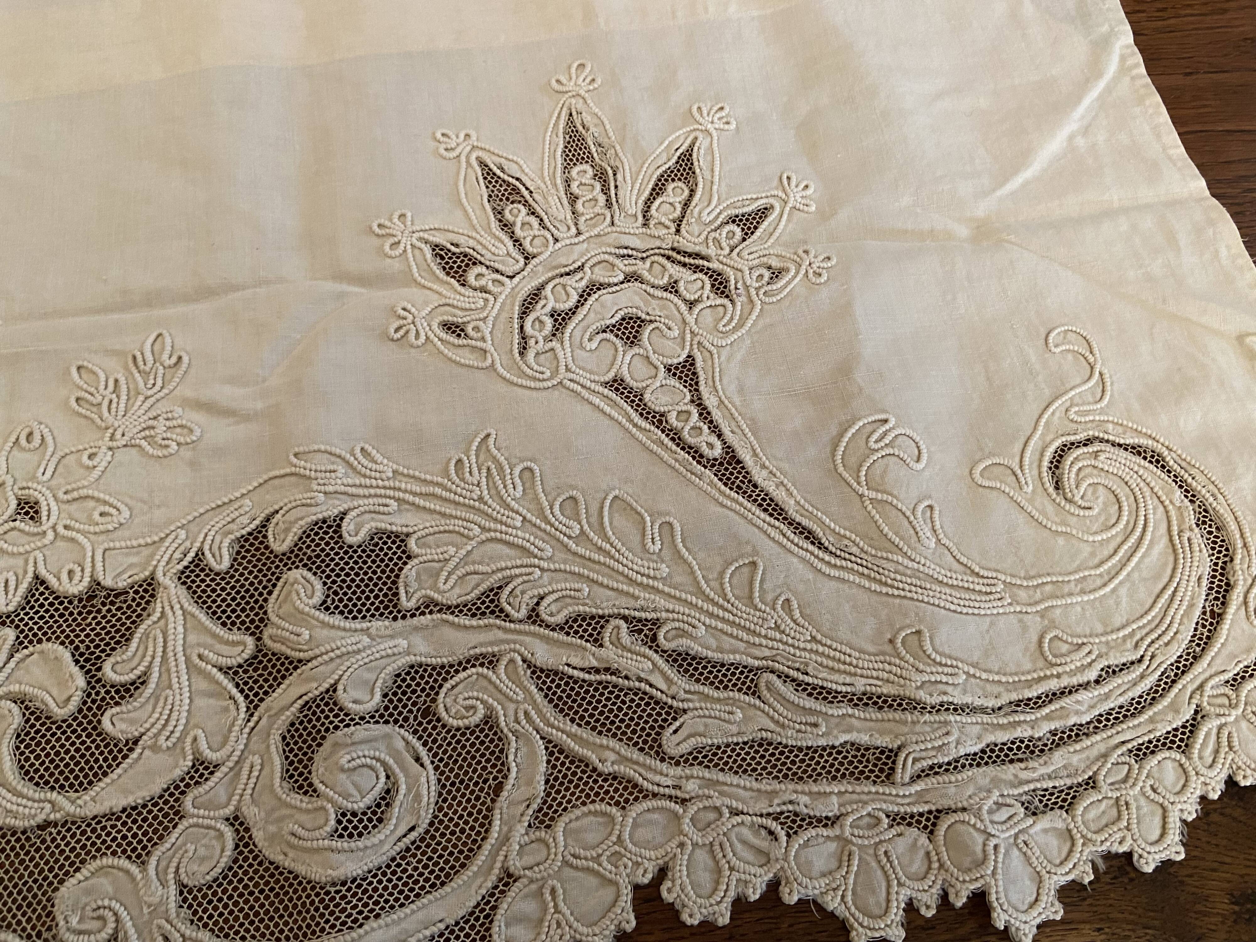 Sheet with embroidered decoration and openwork with cornucopia late nineteenth