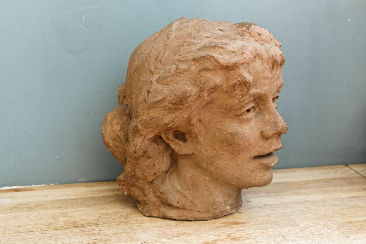 Woman's head, reconstituted stone