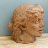 Woman's head, reconstituted stone