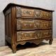 Curved and carved Lyonnaise chest of drawers from the Louis XV period in solid walnut