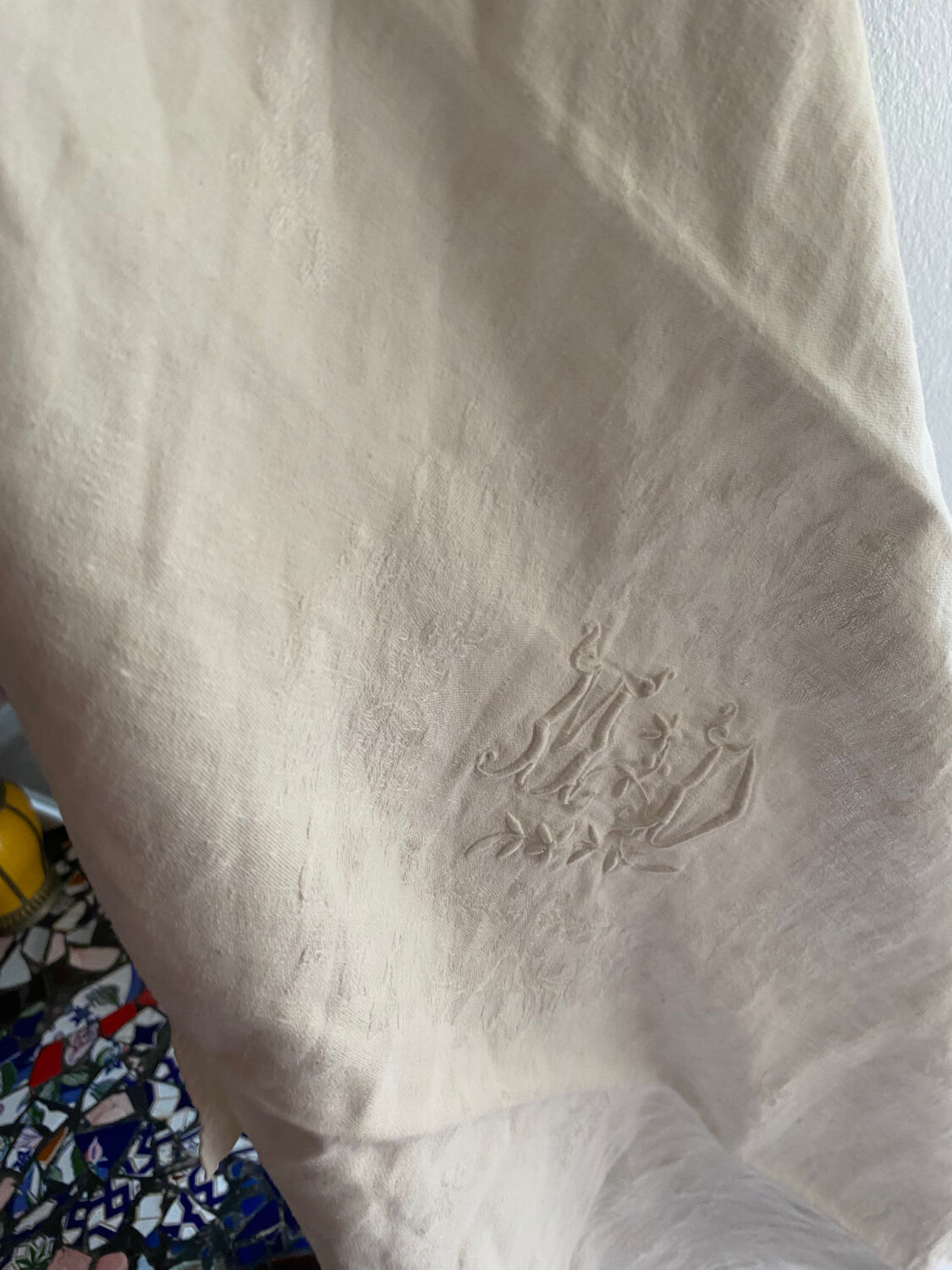 Large white cotton tea towel with damask thread.