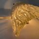 Simple arch-shaped wall light in textured glass, 1950s, Germany.
