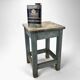 Blue-tinted wooden workshop stool
