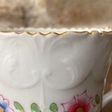 Porcelain cup with chiseled and gilded rim