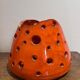Openwork orange ceramic lamp