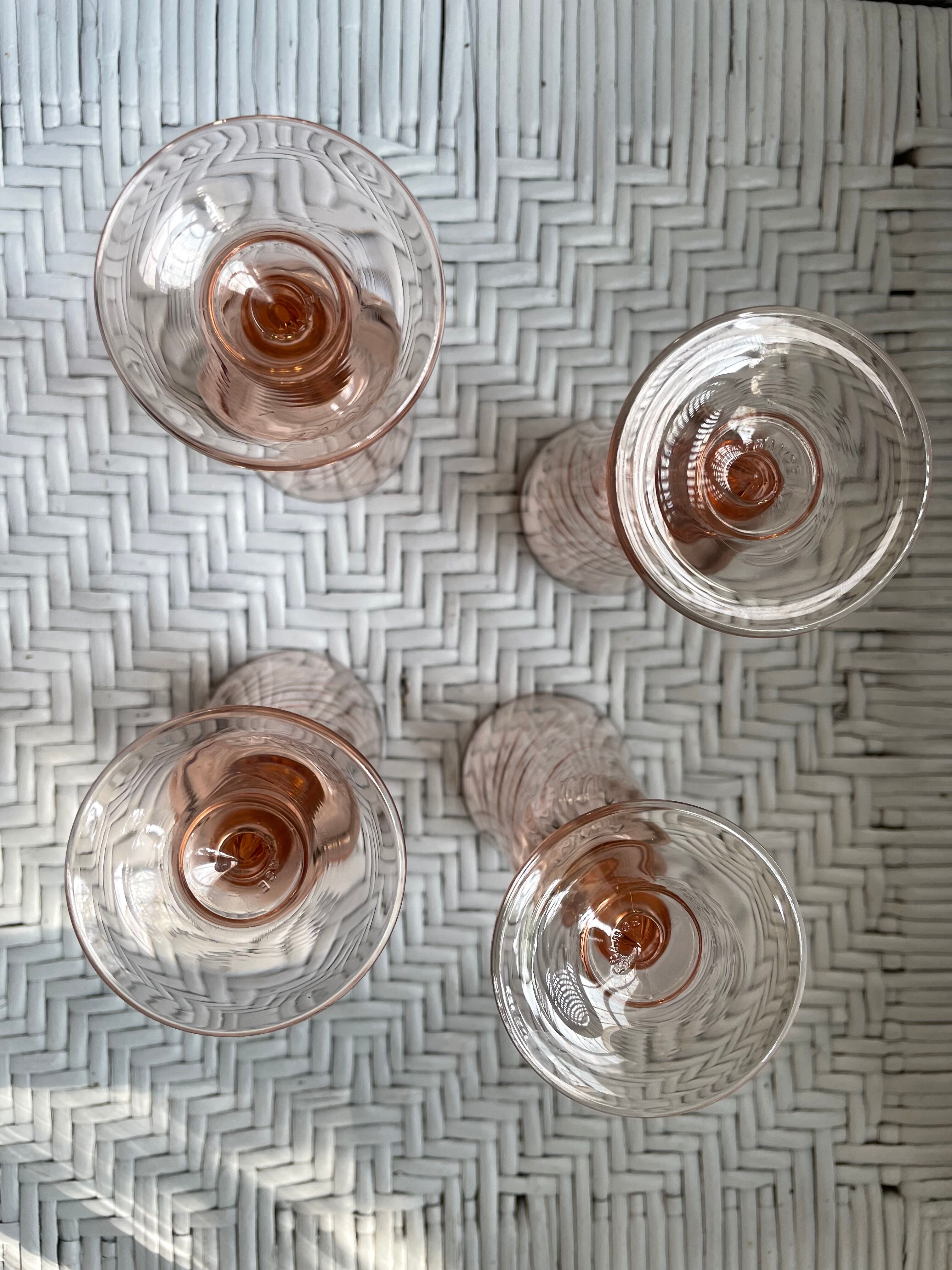 Pink glass champagne flutes from Arcoroc Luminarc model Rosaline