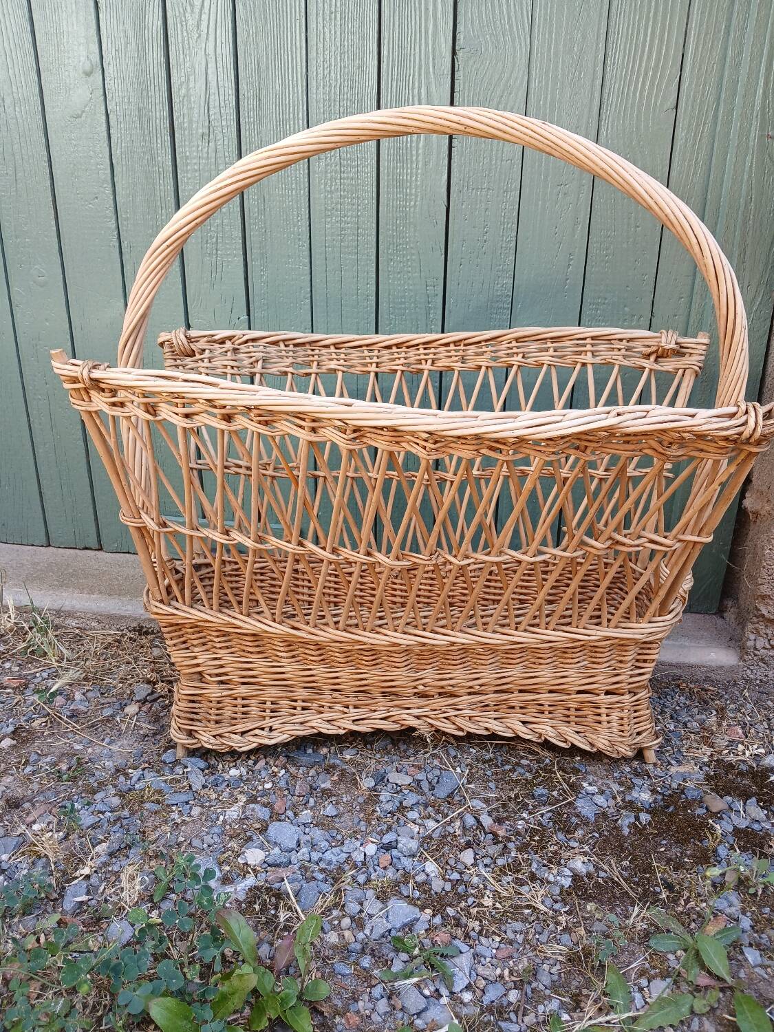 Antique wicker magazine rack